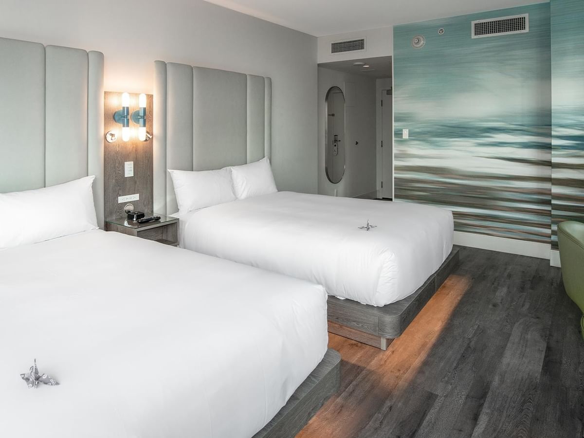Two queen beds in a corner room