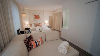 suite with couch and bed