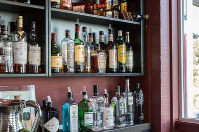 Liquor kept on shelves in 5200 lounge at Heritage House Resort