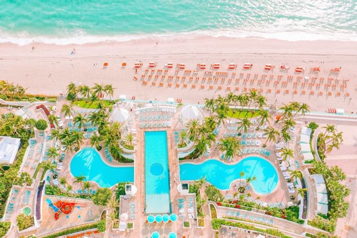 Aerial view of the pool and beach area of The Diplomat Resort
