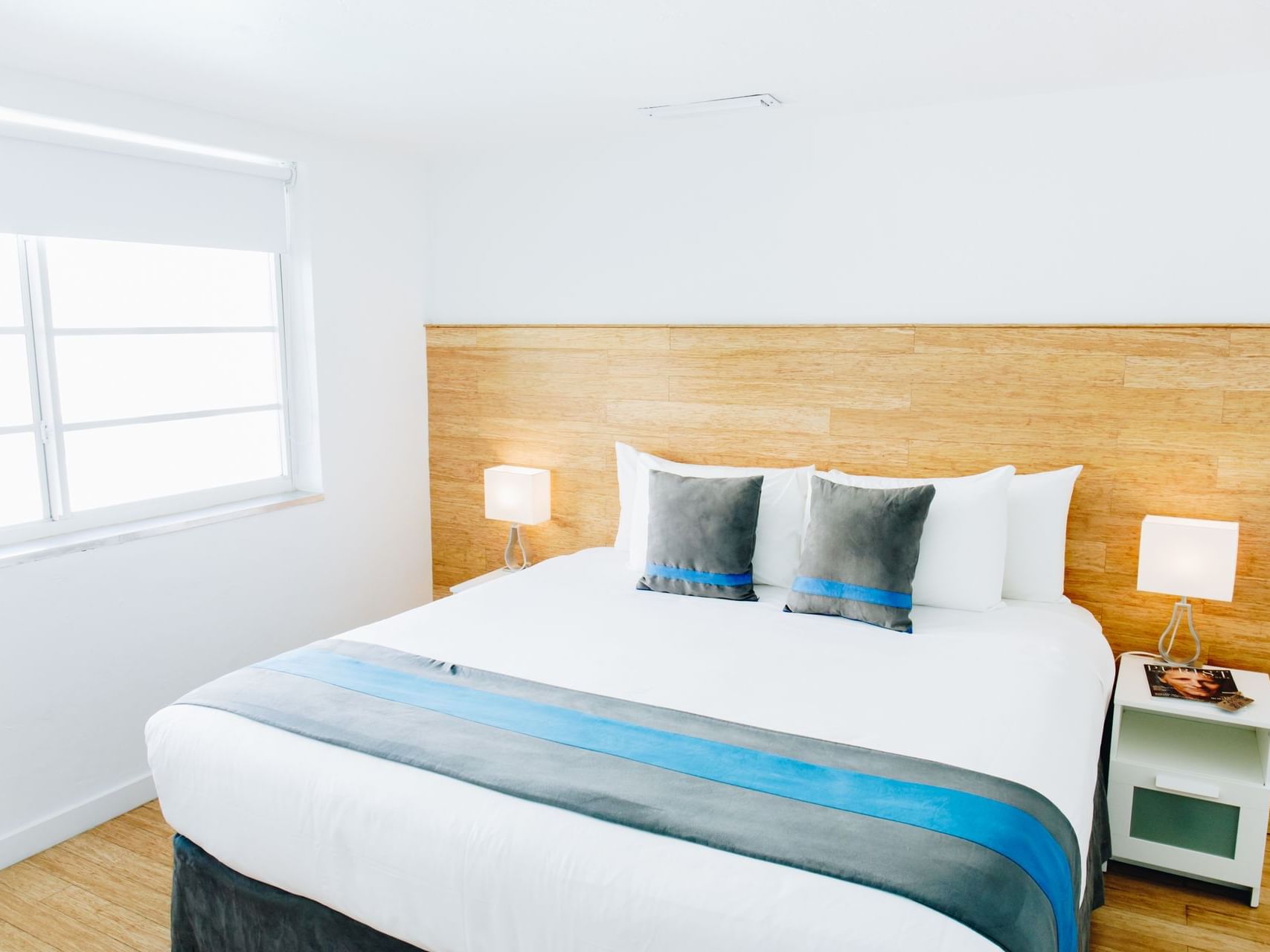 Closeup of a bed in Standard King Room at Aqua Hotel & Suites