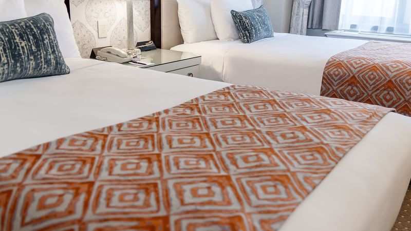 Premier City View with two double beds & nightstand at Warwick New York