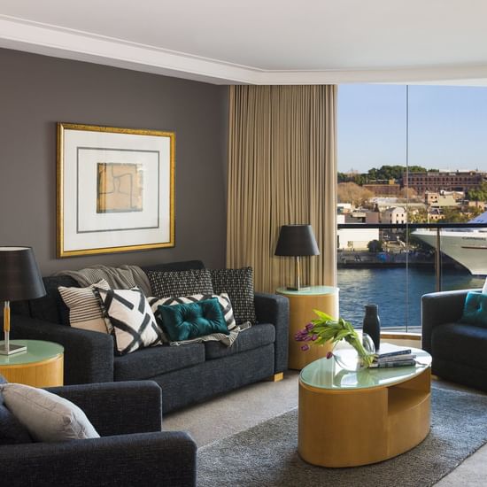 Living area of Harbour View Room at Pullman Quay Grand Sydney