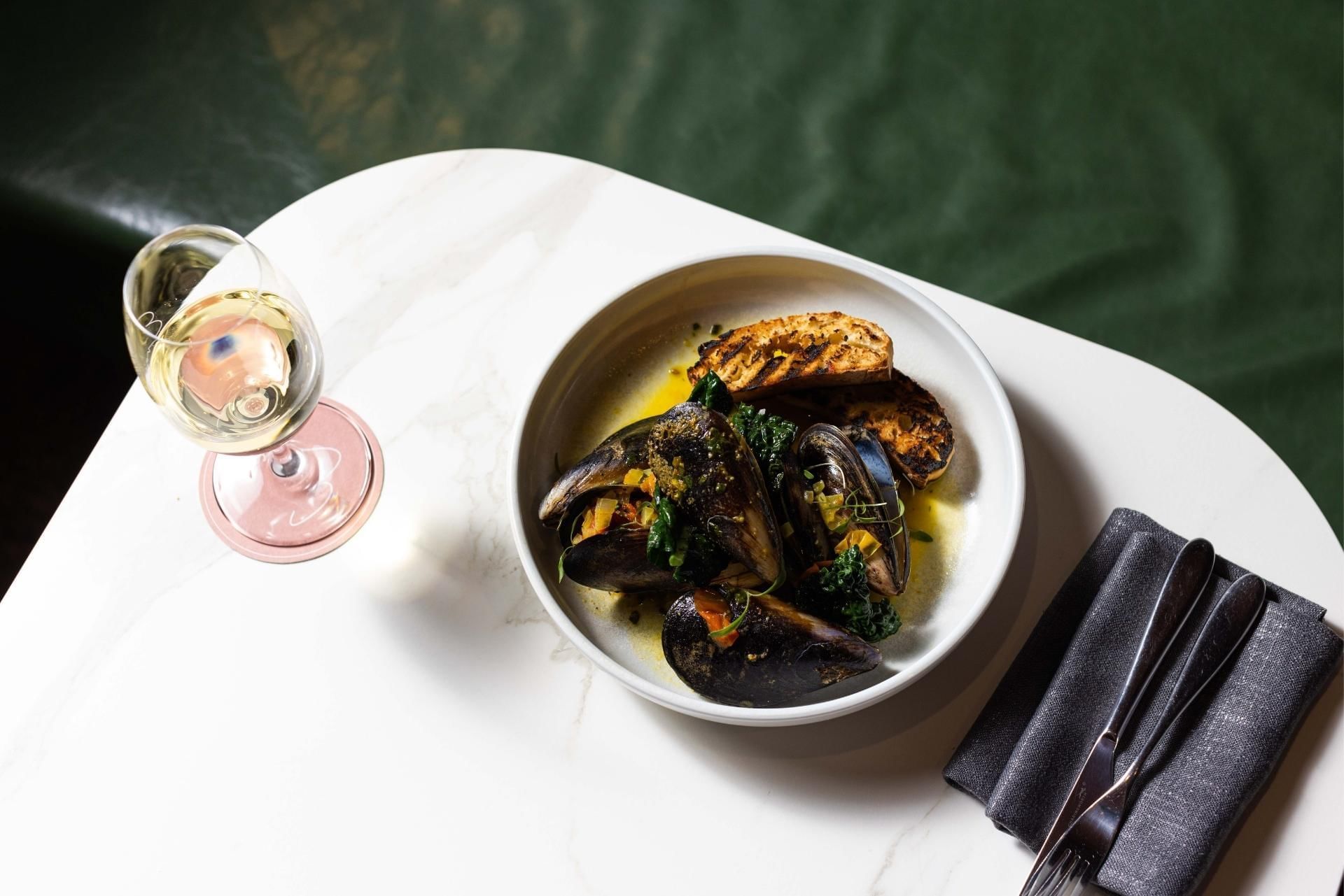 Spicy mussels with toast dish at Pullman Melbourne CDB