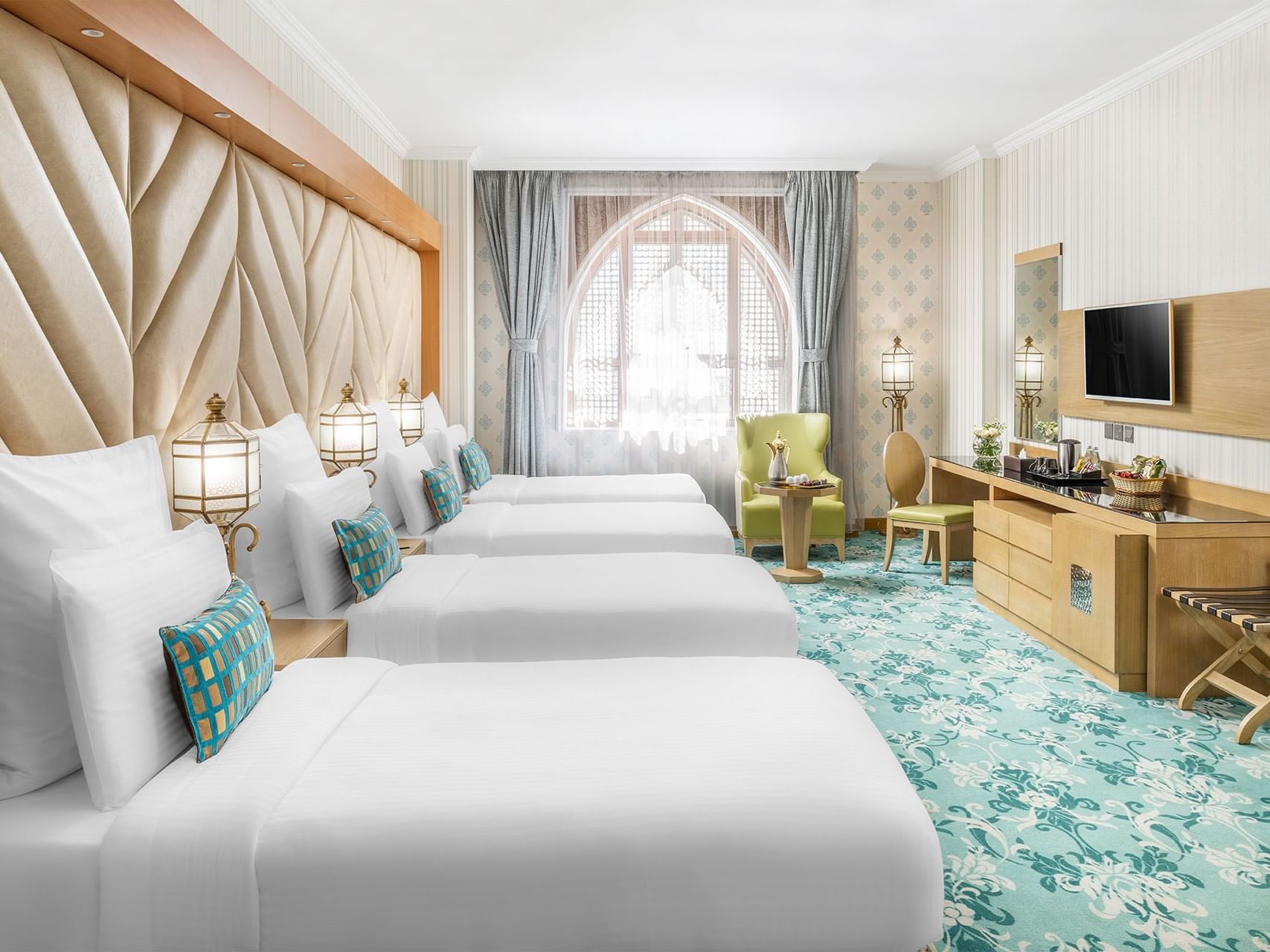 Twin beds in standard Quadruple room at Elaf Al Taqwa