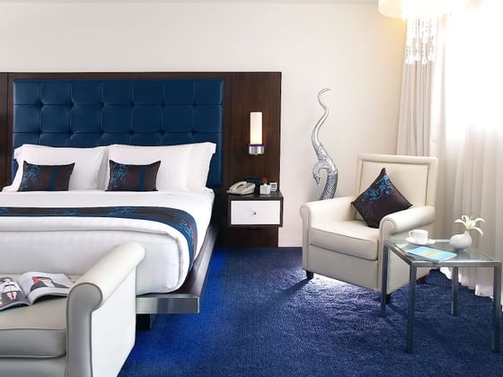 Deluxe suite bed in room at Dream Bangkok.