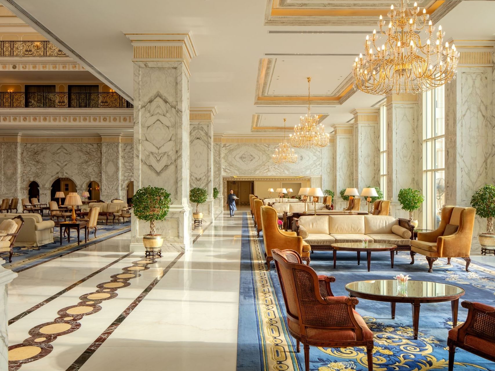 Seating arrangements in Al Liwan Lounge at The Regency Hotel