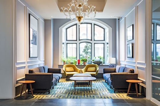 Elegant Lobby with Sofas and big window, Edwardian Hotels Group