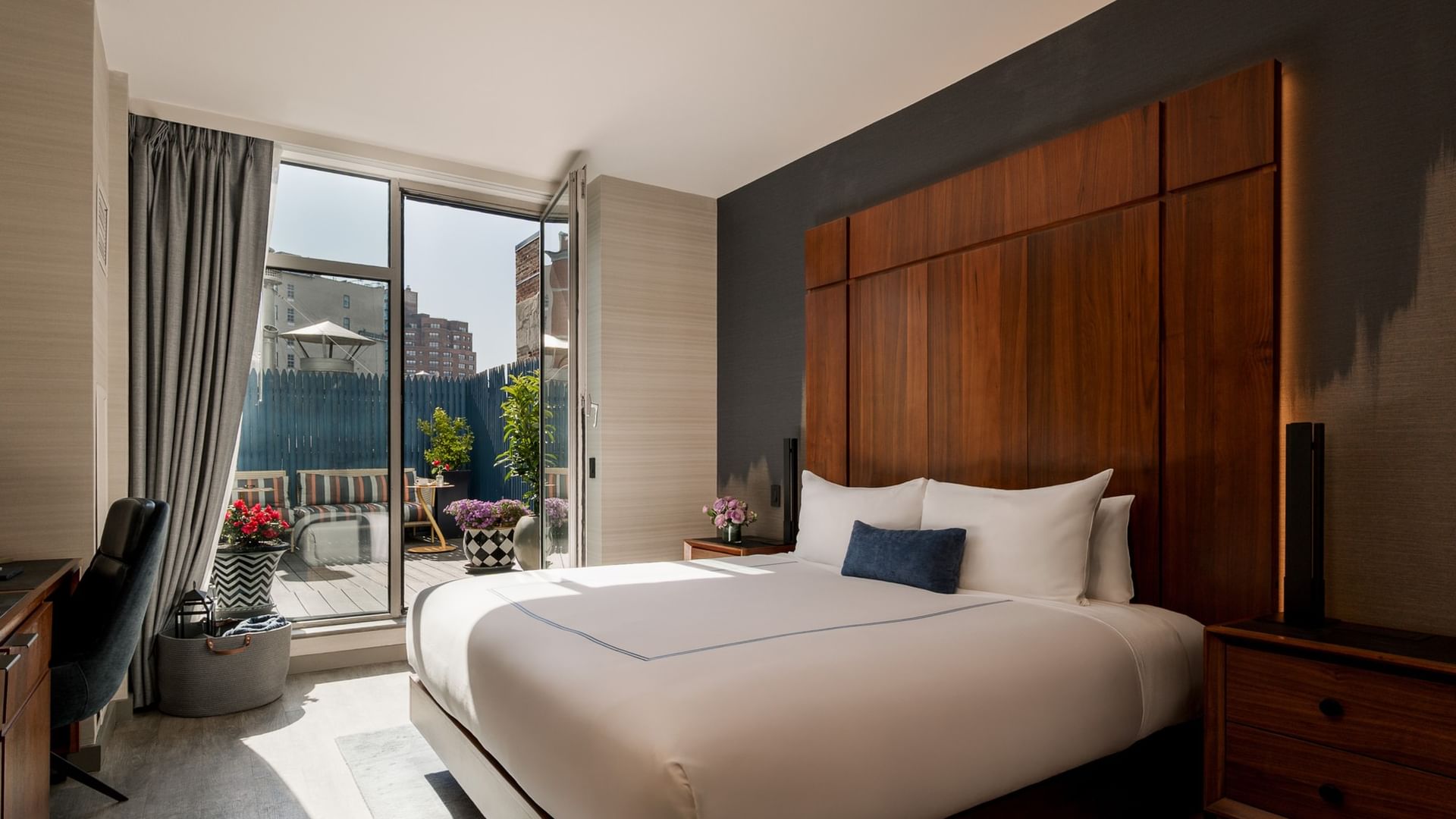 Terrace Room with a cozy king bed and outdoor access at Gansevoort Meatpacking NYC, one of the best hotel rooms in Manhattan