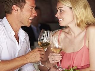 Happy couple with wine glasses