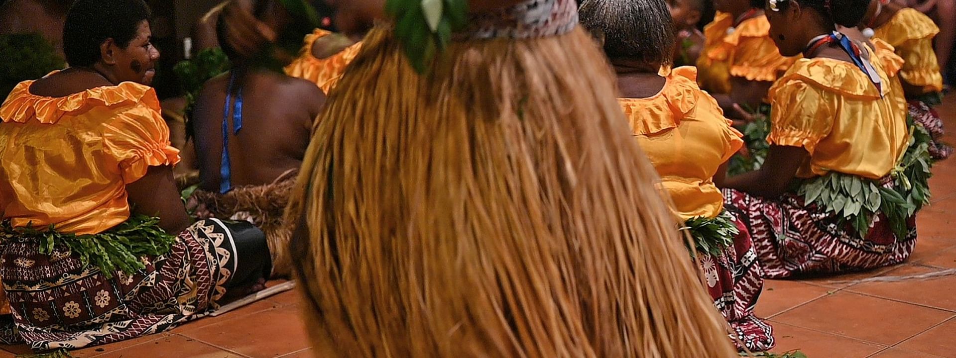 Group performing traditional Fijian dance at The Naviti Resort in Korolevu