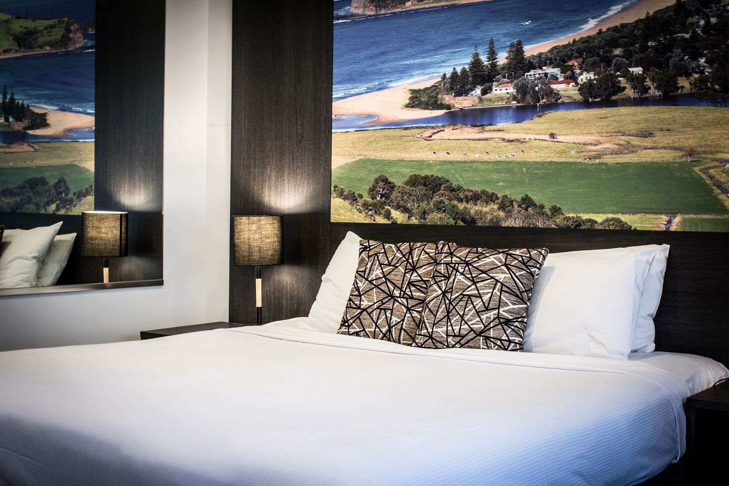 Comfy bed in Deluxe King Balcony Room at Mercure Gerringong