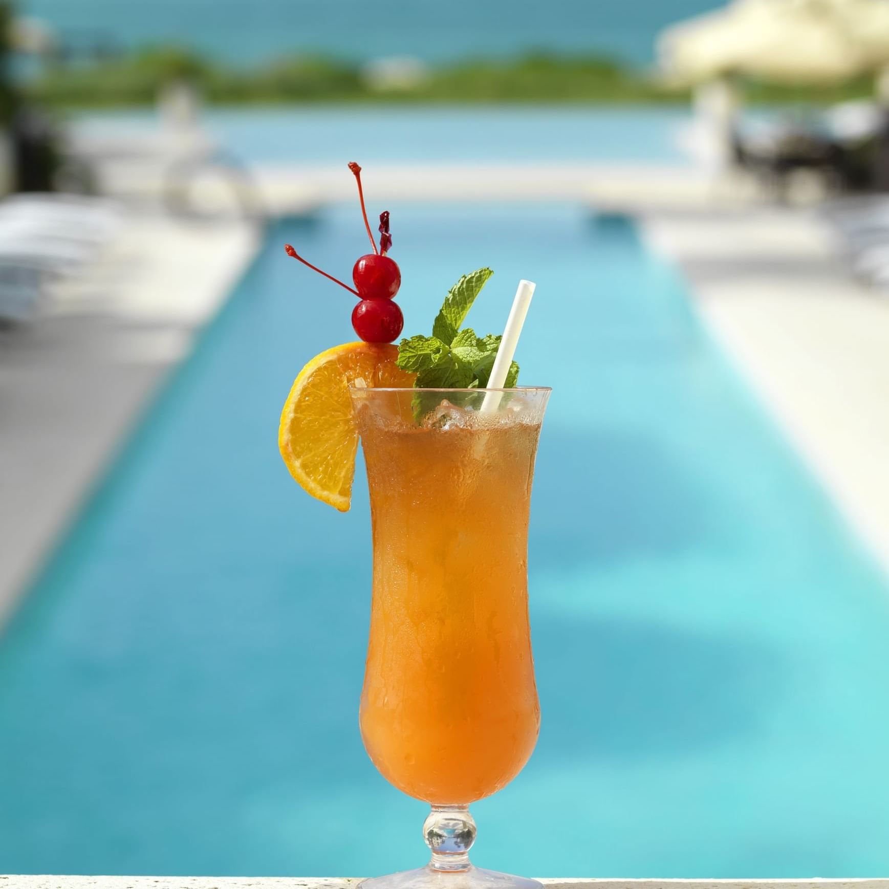 Iced Soft drink by the pool at The Somerset On Grace Bay  