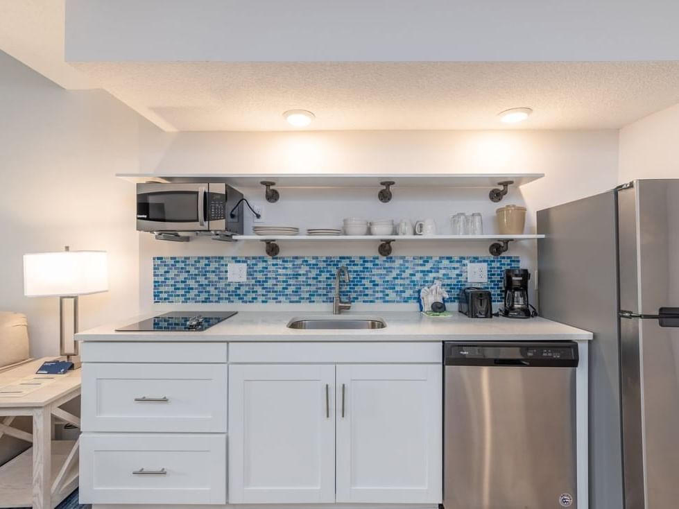 Luxury kitchen with fridge in King Suite at The Palmera Inn and Suites