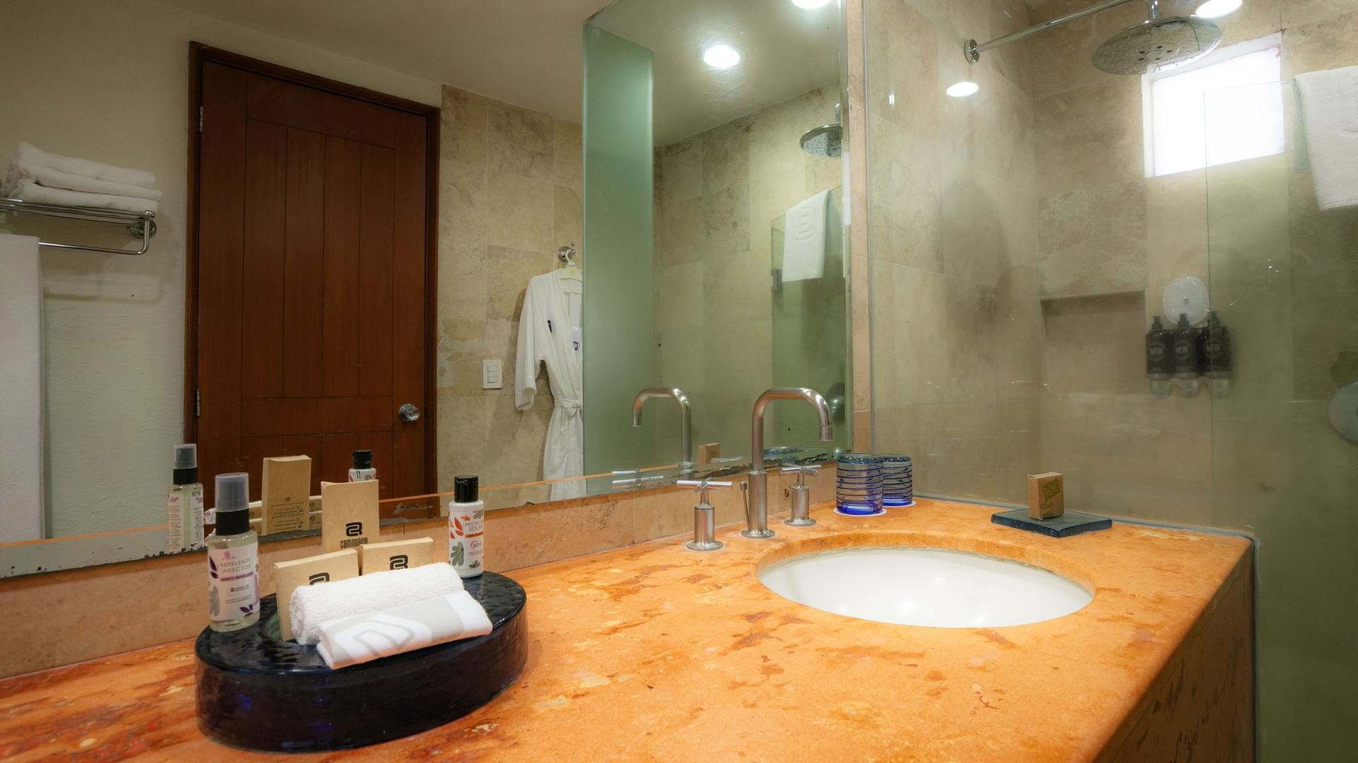 Elegant bathroom with toiletries and large mirror in King Camino Real Club at Camino Real Guadalajara, Zapopan