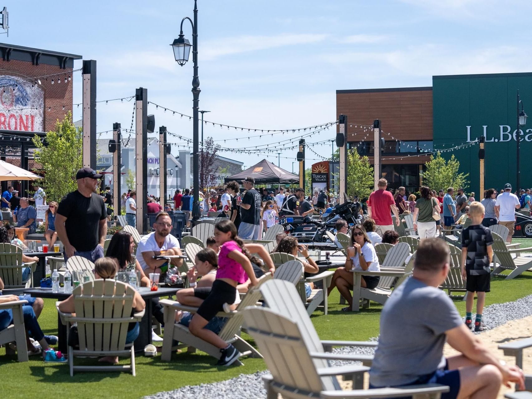 People lounging & enjoying the community in Tuscan Village near The Artisan Hotel at Tuscan Village