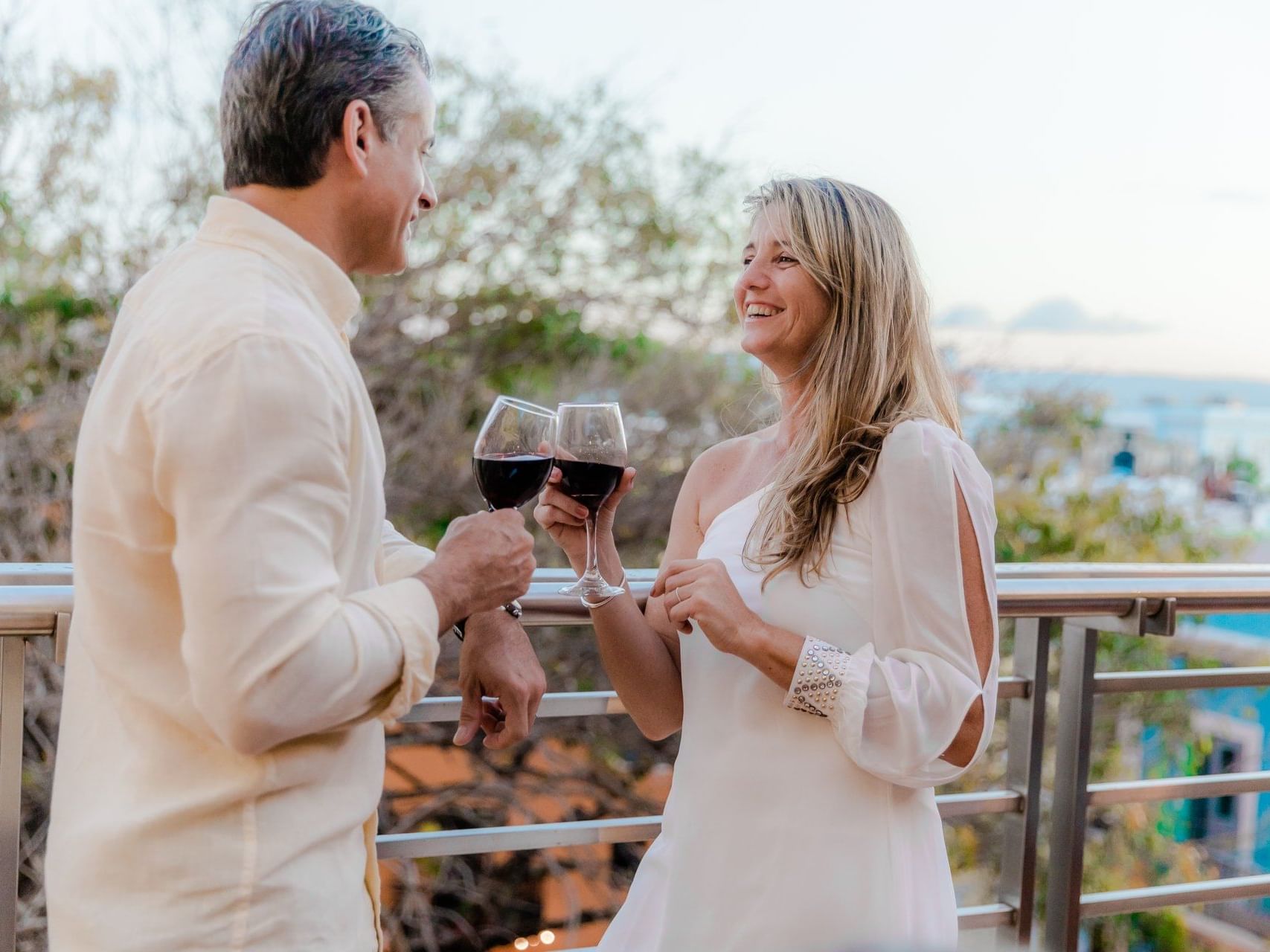 Mature couple having wine at Hotel El Convento