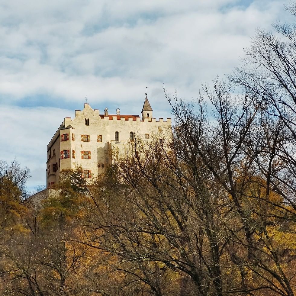 Distant view of Bruneck Castle near Falkensteiner Hotels