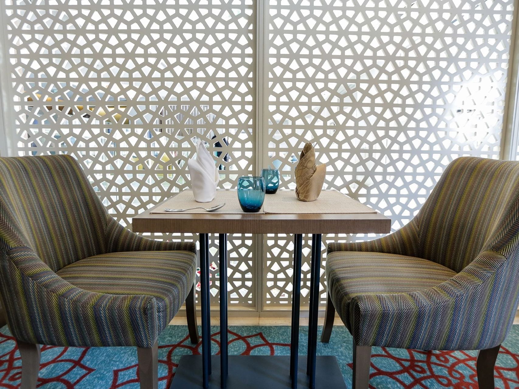 Couple dinning table in La Mode at Mena Plaza Hotel