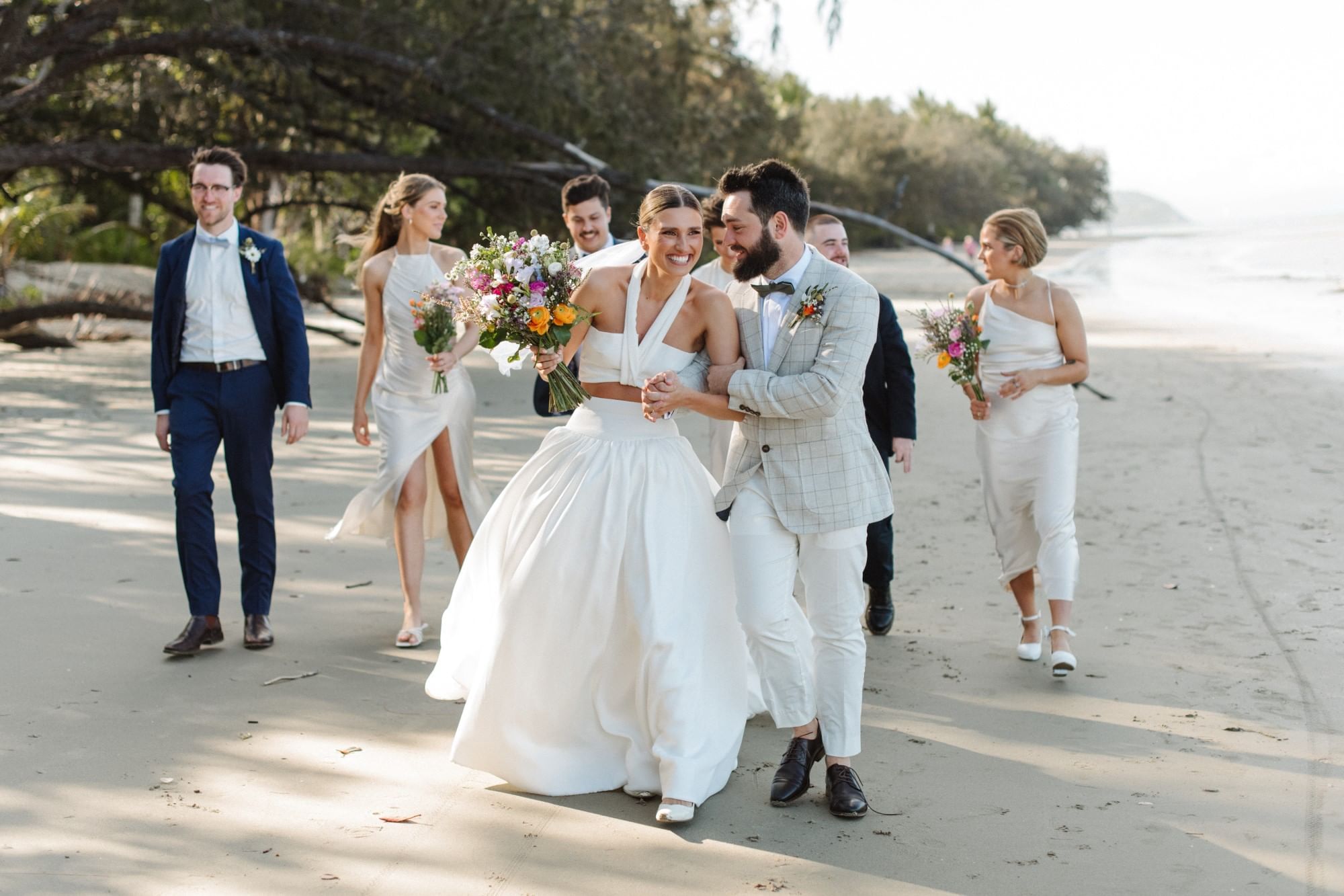 Katherine and Louis wedding by beach in Four Mile Beach at Pullman Port Douglas Sea Temple Resort & Spa