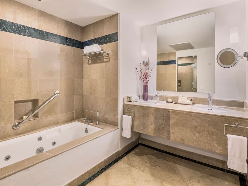 Bathroom vanity & tub in Governor Suite at FA Hotels & Resorts