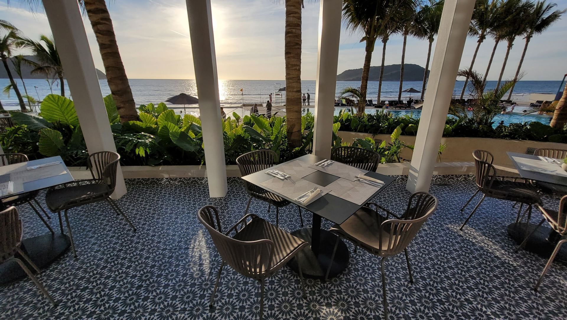Outdoor restaurant with ocean view at Viaggio Resort Mazatlan