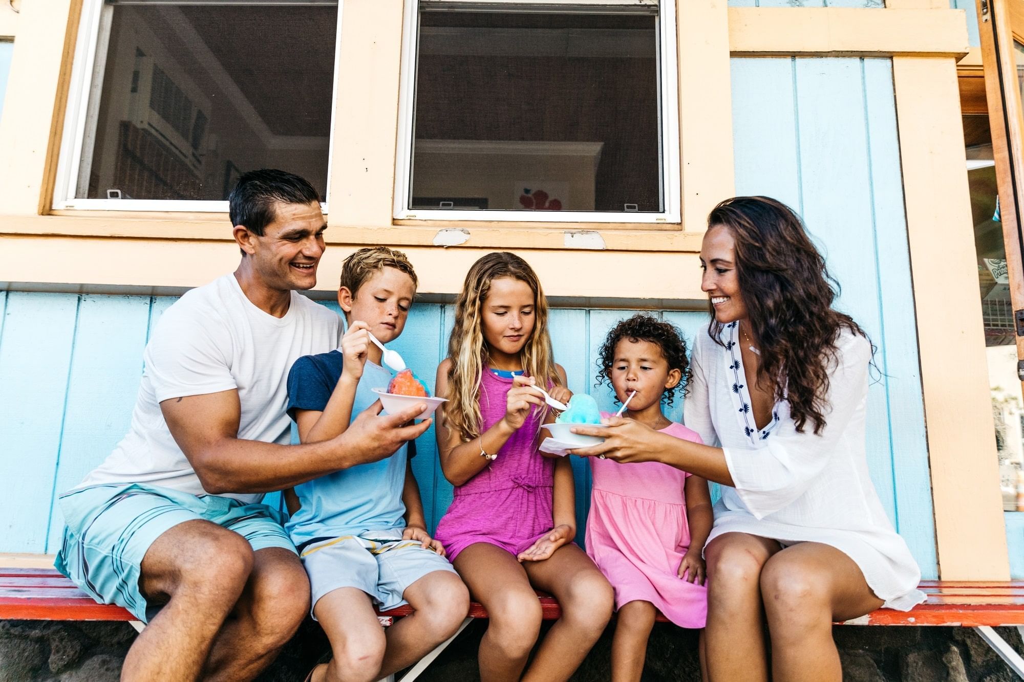 A family enjoying their food at Waikiki Resort Hotel