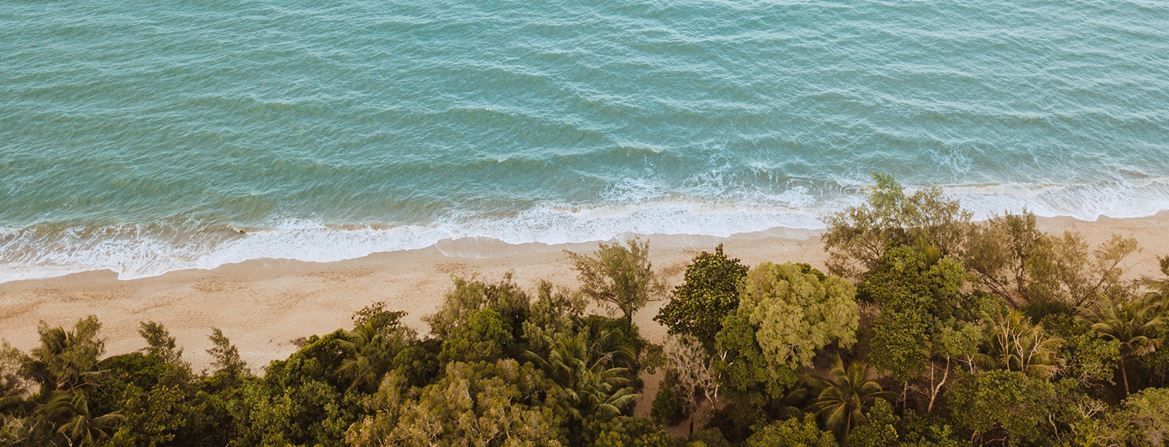 Aerial view of beach near Pullman Palm Cove Sea Temple Resort
