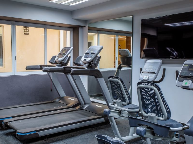 Treadmills in the fitness center at Gamma Hotels