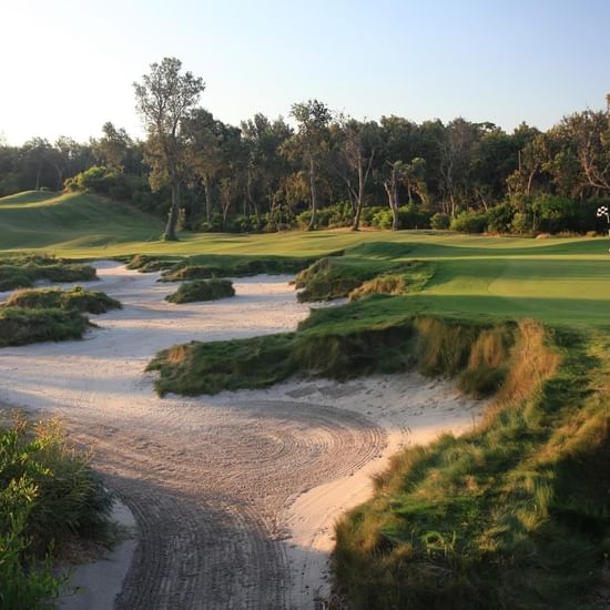 Aerial view of golf course near Pullman Magenta Shores Resort