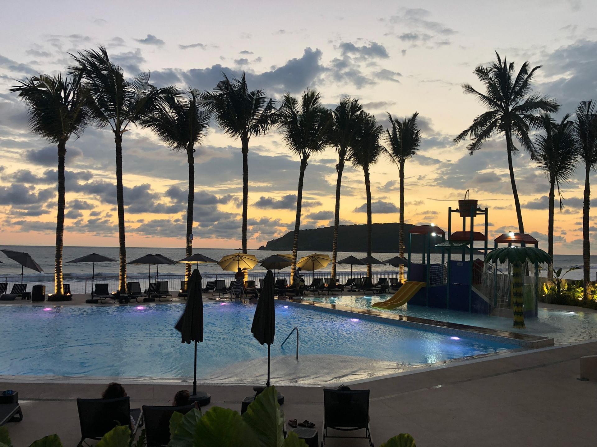 Evening view of the pool at Viaggio Resort Mazatlan