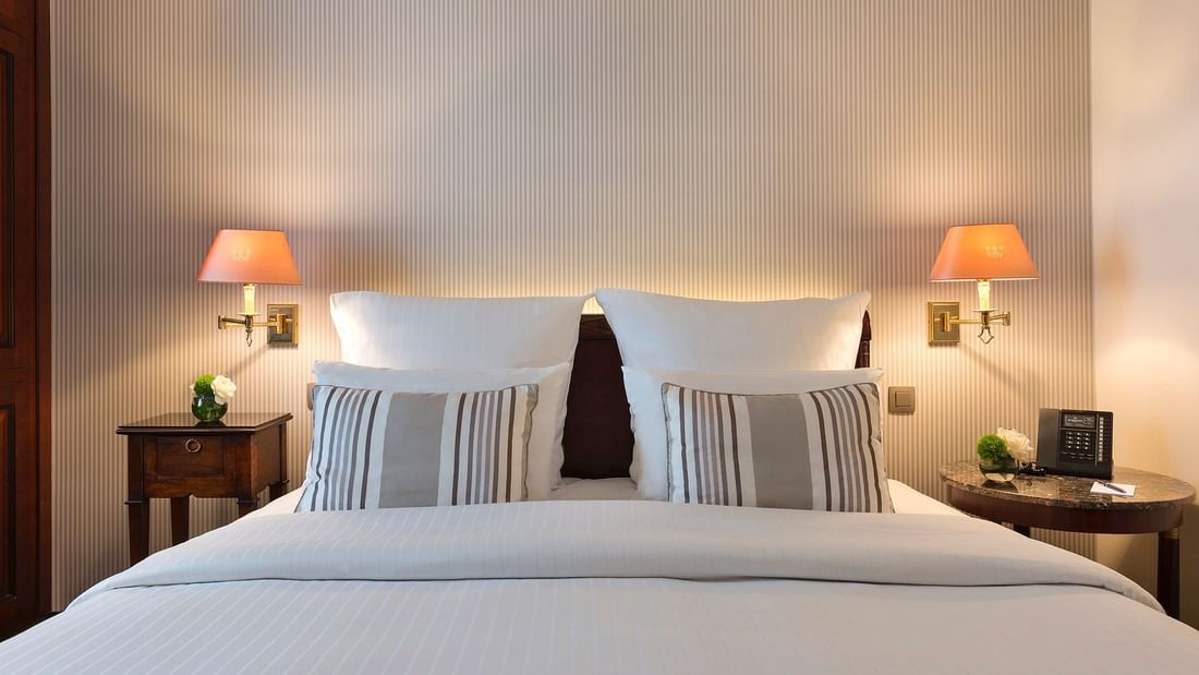 King bed with premium bedding in Classical Room Bed at Brussels Warwick Hotels