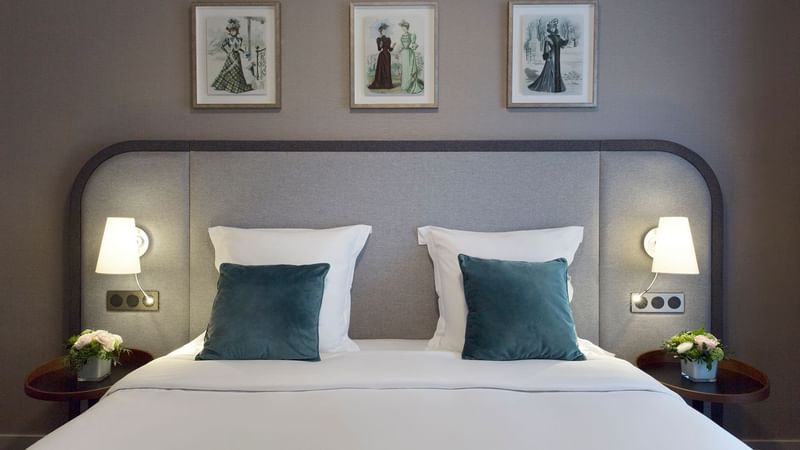 Close-up of bed in Deluxe Room at Warwick Reine Astrid Lyon