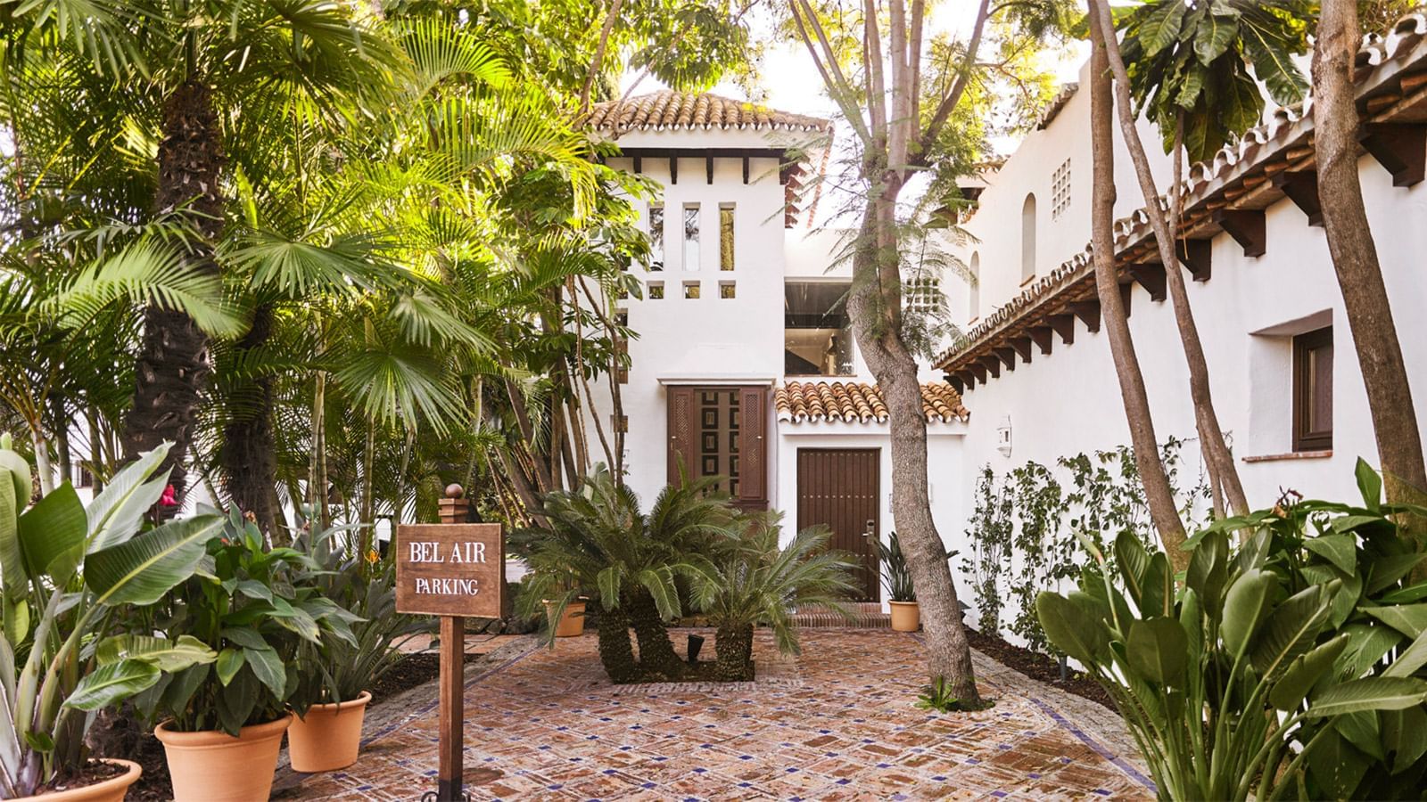 Garden & the parking area of Bel-Air at Marbella Club