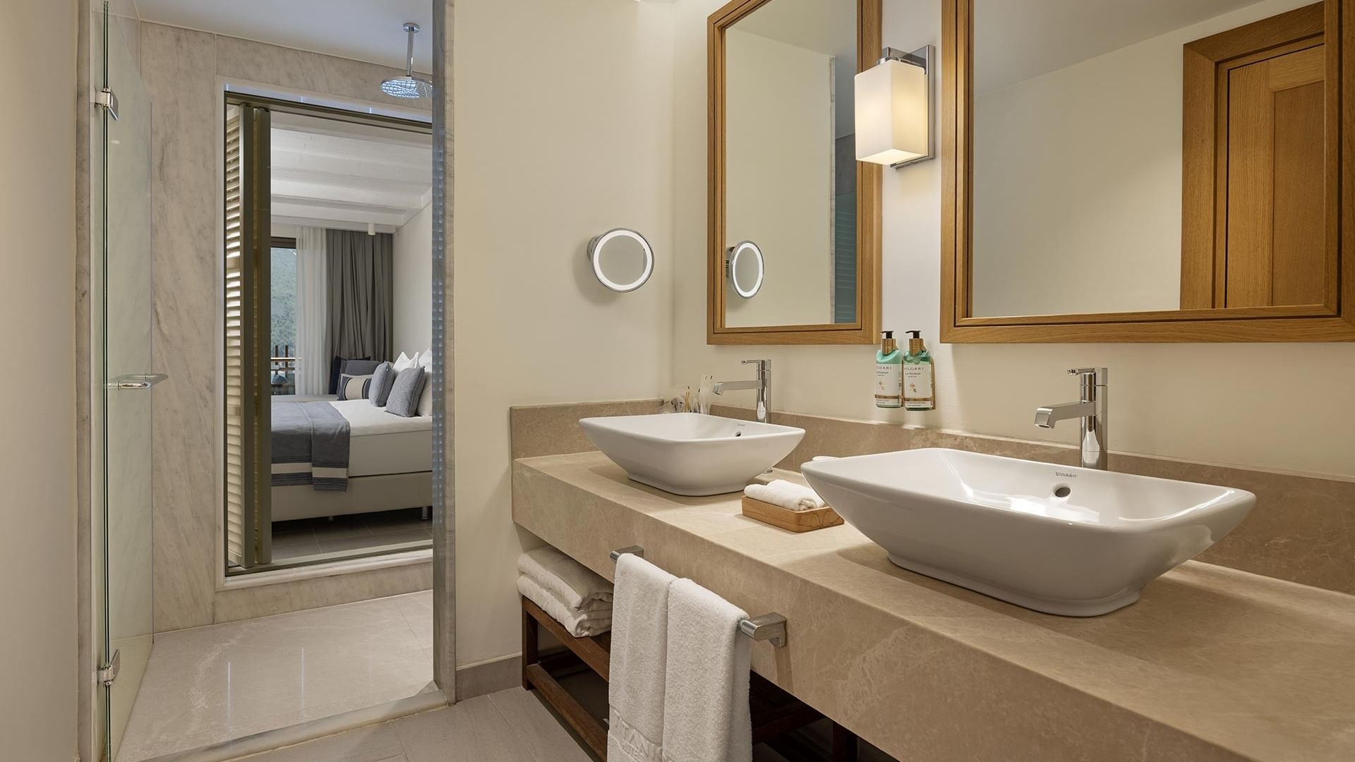 Bathroom interior of the Superior Sea View Room with mirrors at Titanic Luxury Collection Bodrum