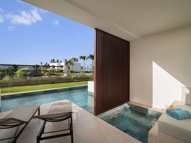 Sunbeds & pool in Honeymoon Suite at Live Aqua Resorts