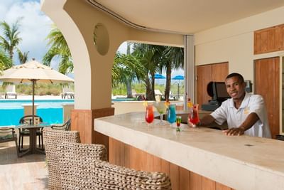 View of Jojo's Poolside Cafe at Windsong Resort On The Reef