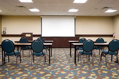 Tamar Meeting Room with classroom table set up at Rosen Inn International