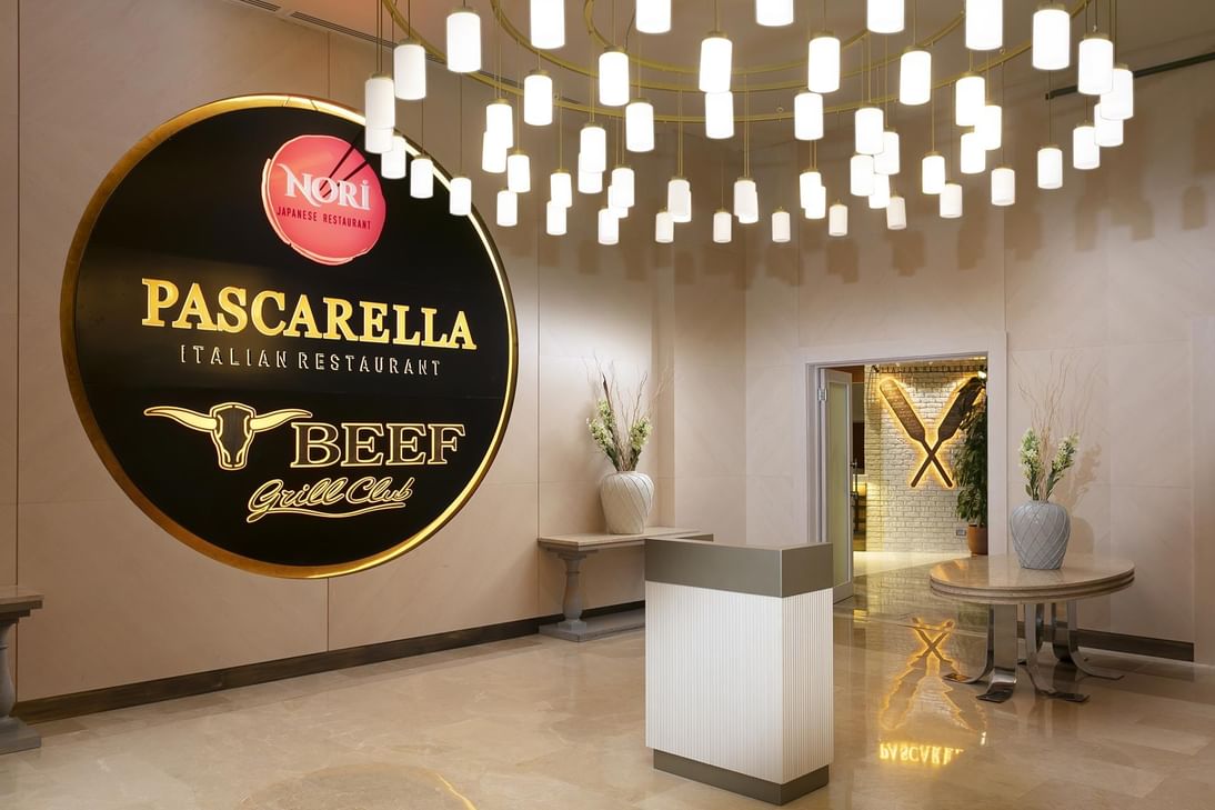 Pascarella Italian Restaurant lobby area with reception desk at Titanic Deluxe Lara