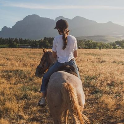 Girl riding a horse near Falkensteiner Hotels and Residences