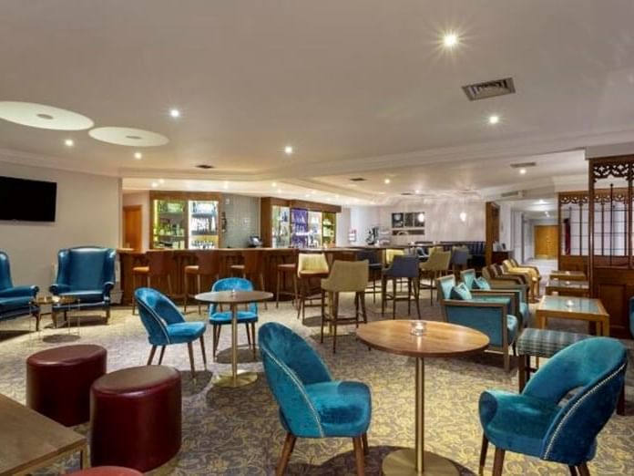 Bar counter, dining area in Squires Bar, Bridgewood Manor Hotel