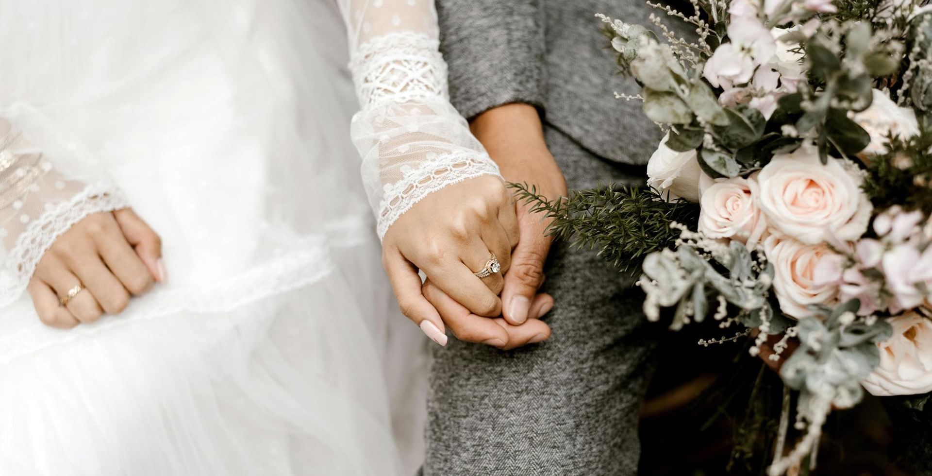 Married Couple holding hands the oceanside, a coast hotel