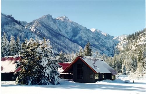 Distant exterior view of Sleeping Lady Mountain Resort at snow