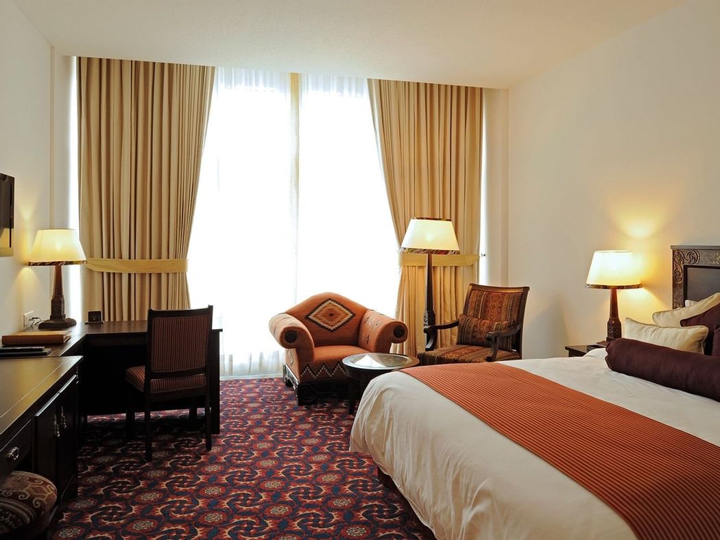 Executive Room with 1 King Bed, couch at Dushanbe Serena Hotel