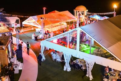 Distance view of outdoor banquet, The Morgan Resort Spa Village