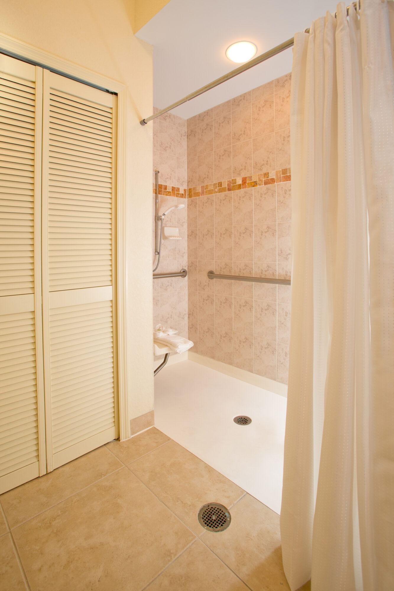 Roll in Shower in a three bedroom suite at Lake Buena Vista Resort Village and Spa