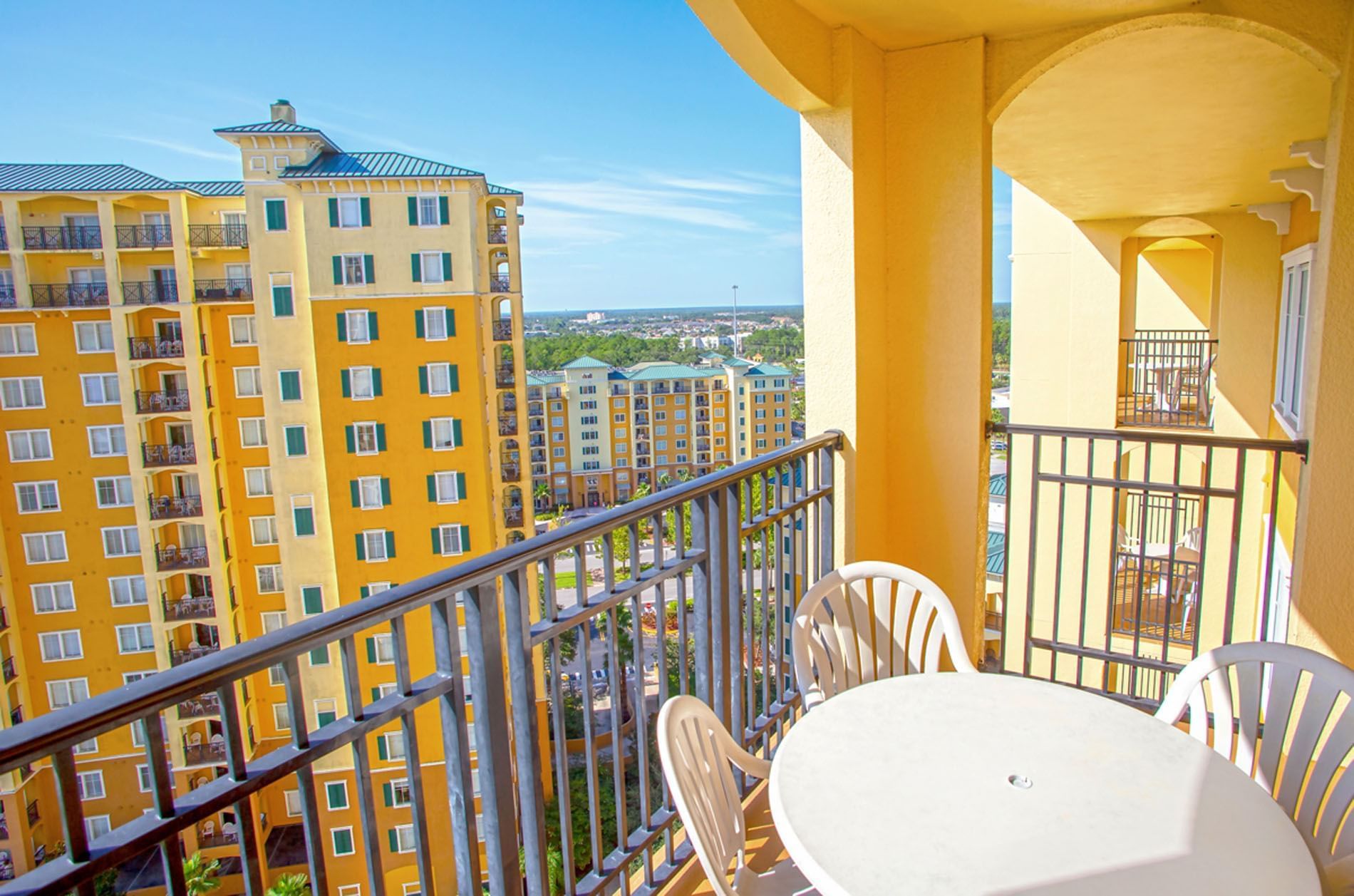 Balcony with terrace overlooking the city in 4 Bedroom 4 Bath Standard Suite at Lake Buena Vista Resort Village & Spa