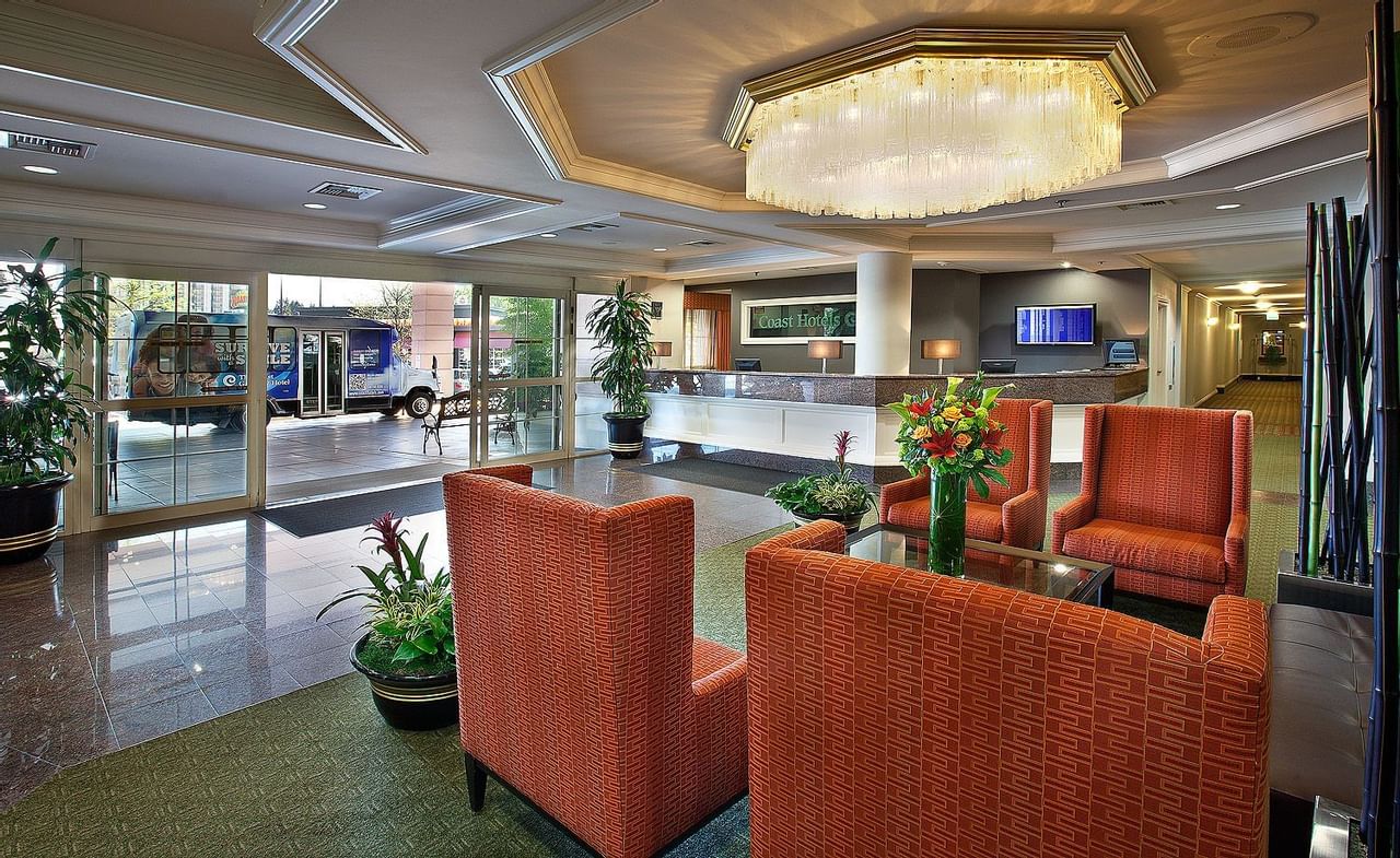 Chairs in lobby of modern hotel