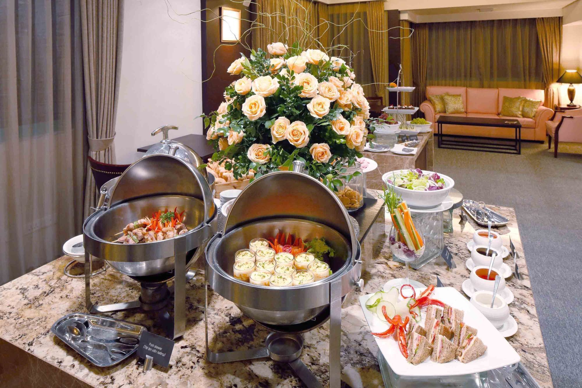 Buffet table with food warmers, salads & sandwiches at Sunway Hotel Hanoi