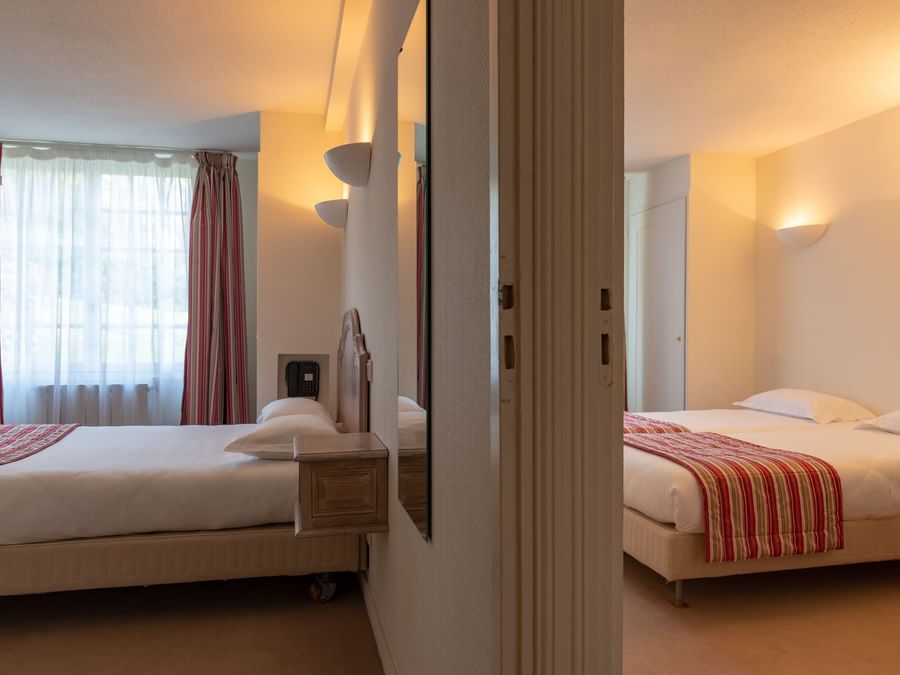 Standard Family Suite bedrooms at The Originals Hotels